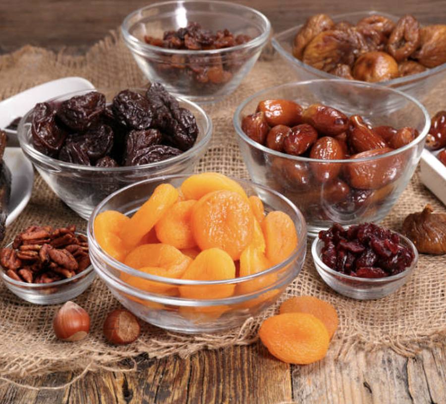 Bowls of assorted dried fruits